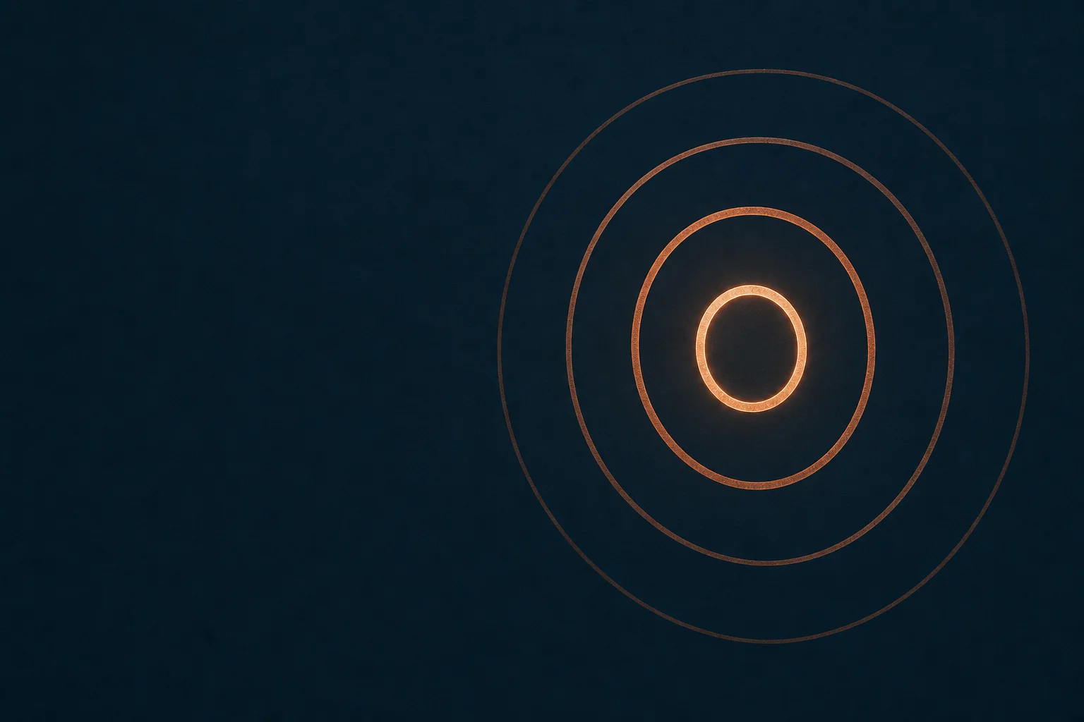 Concentric copper rings of decreasing size on a navy field, the smallest ring brightest