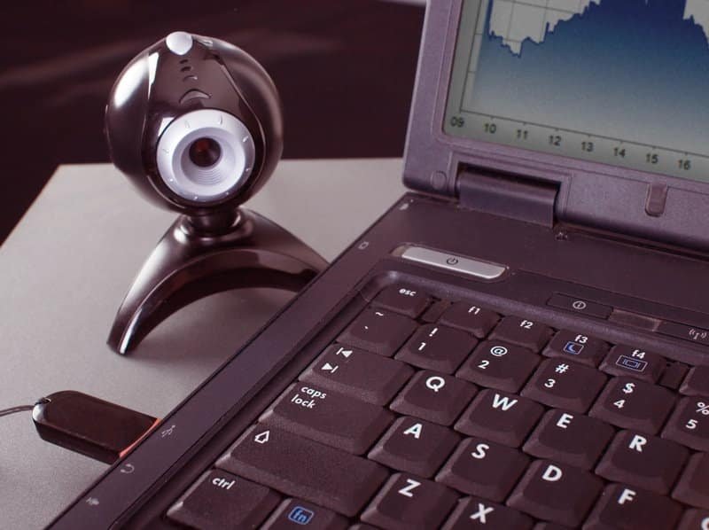 close-up laptop keyboard web camera and usb flash